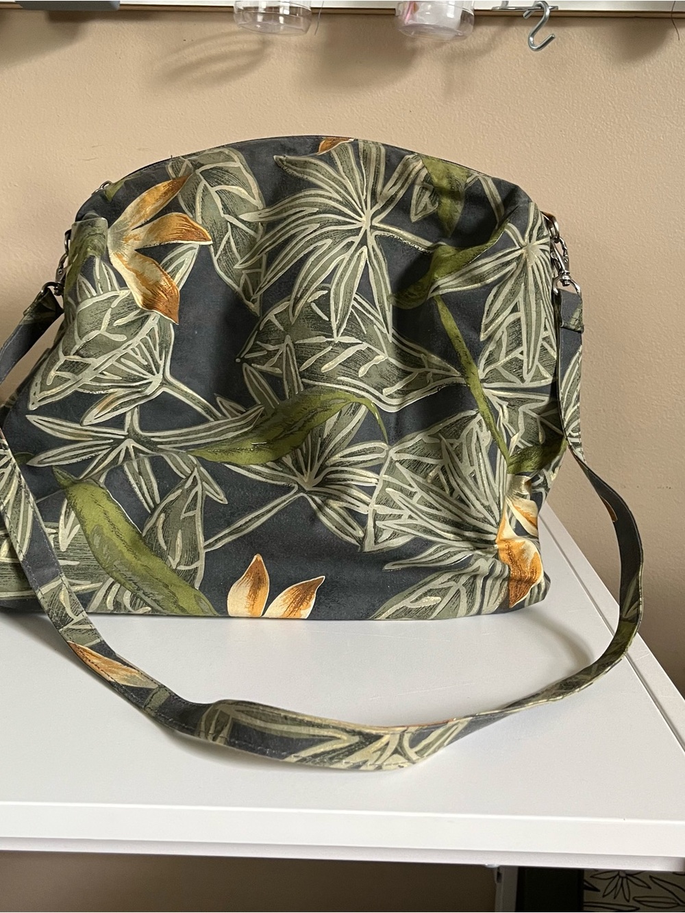 Bueno leaf print slouchy bag with removable strap
